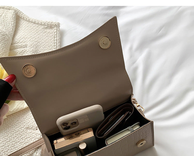 The Top Handle Sling Bag