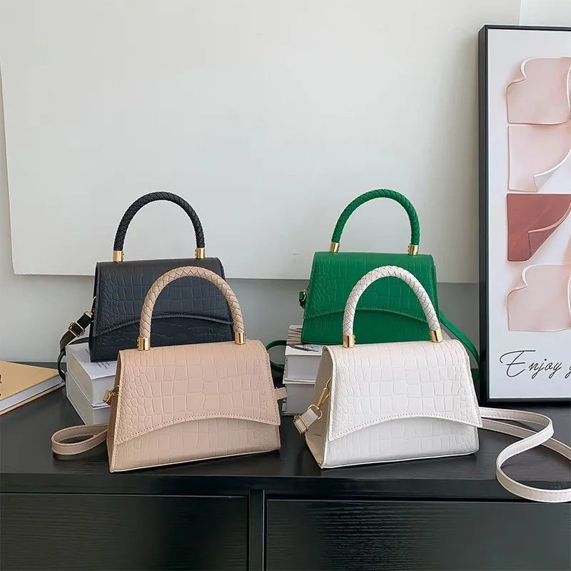 The Top Handle Sling Bag