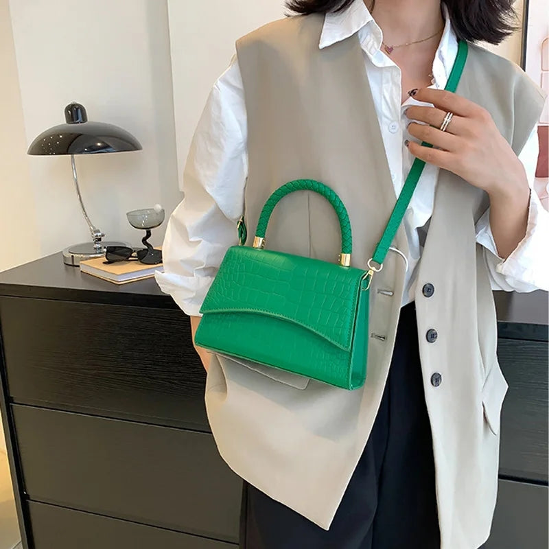 The Top Handle Sling Bag