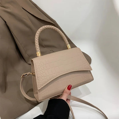 The Top Handle Sling Bag