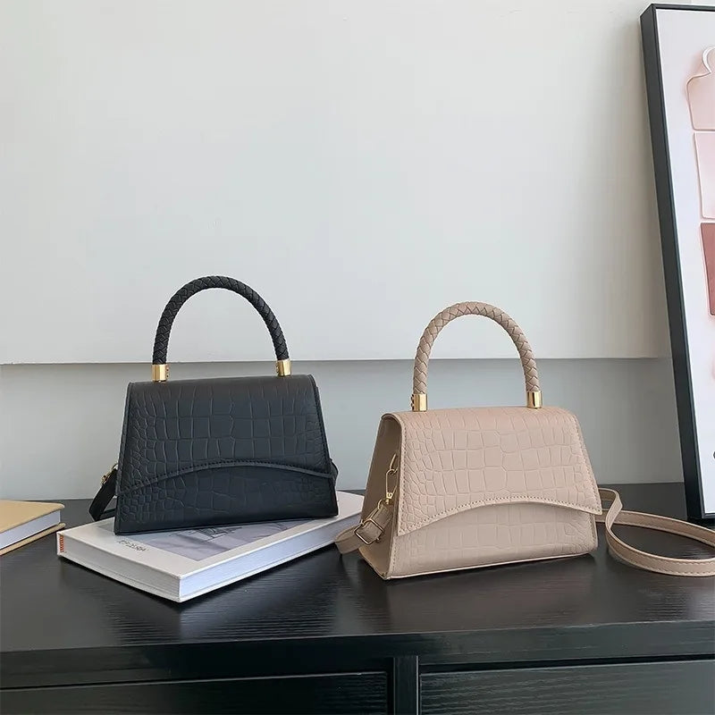 The Top Handle Sling Bag