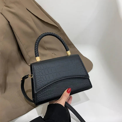 The Top Handle Sling Bag