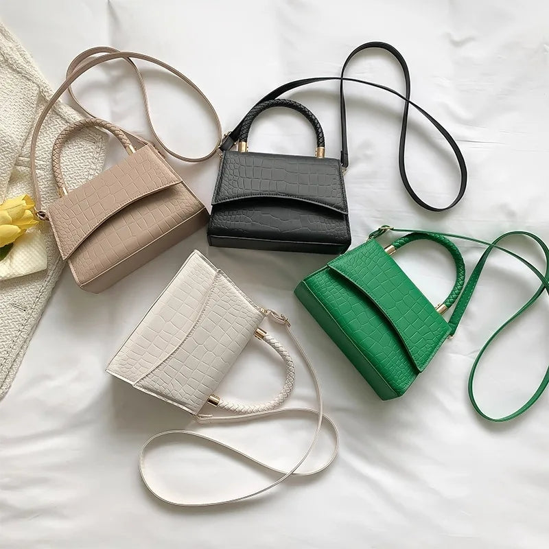 The Top Handle Sling Bag